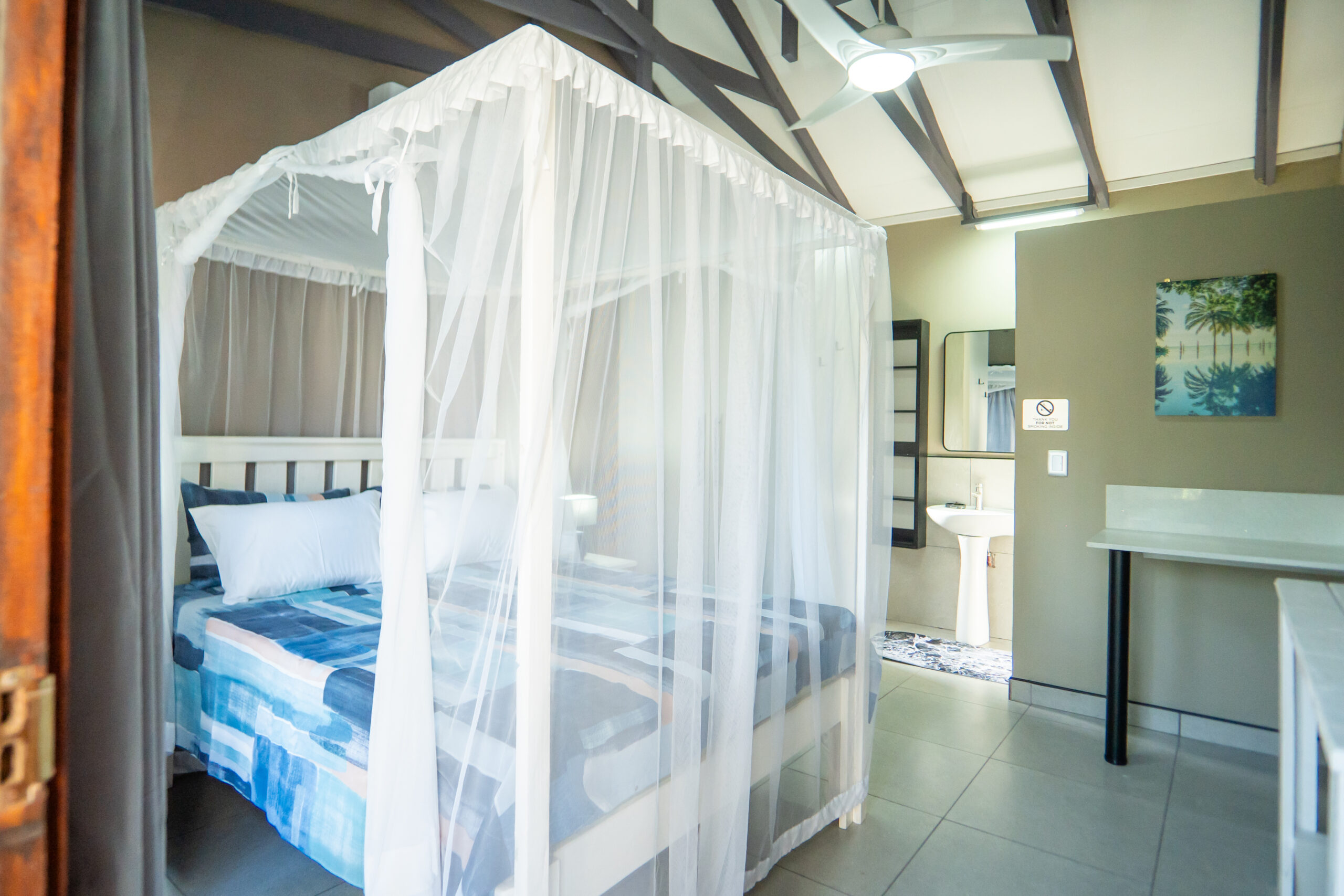 mozambique,self catering accomodation,inhambane,tropical escape,air-conditioned comfort,beachfront access,make a booking,bellavida,accomodation